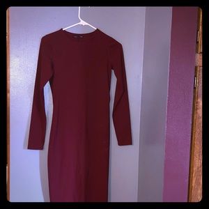 Tight, spandex burgundy long sleeved dress